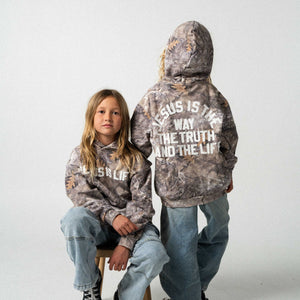 front and back of youth camouflage cotton french terry hoodies with applique letters that read Jesus is the way the truth and the life